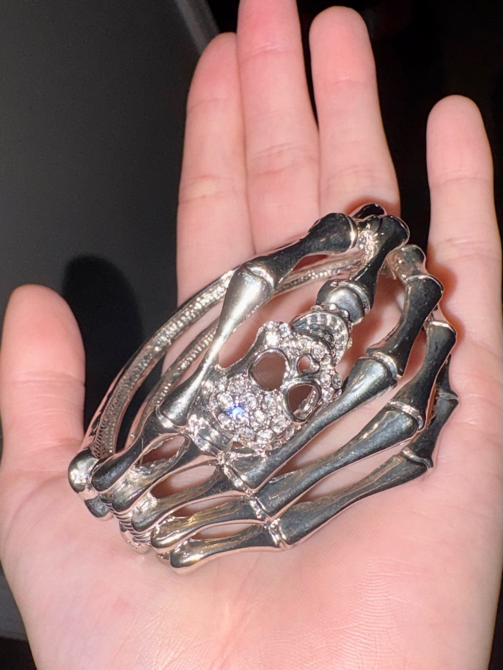 Silver Skeleton Hand Ring with Crystal Skull
